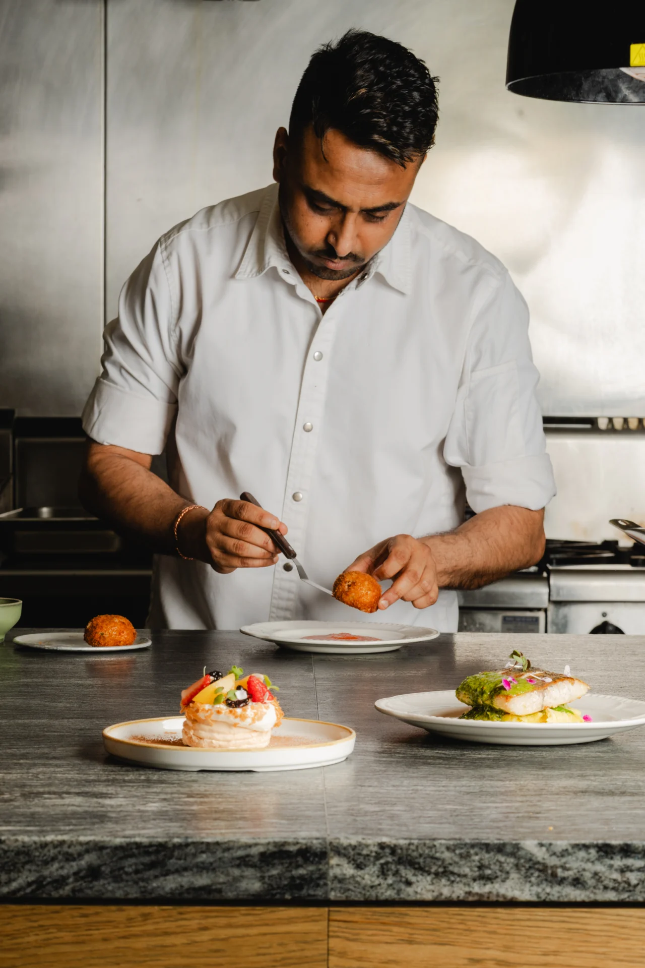 Head Chef platting at Birdie Bar and Brasserie