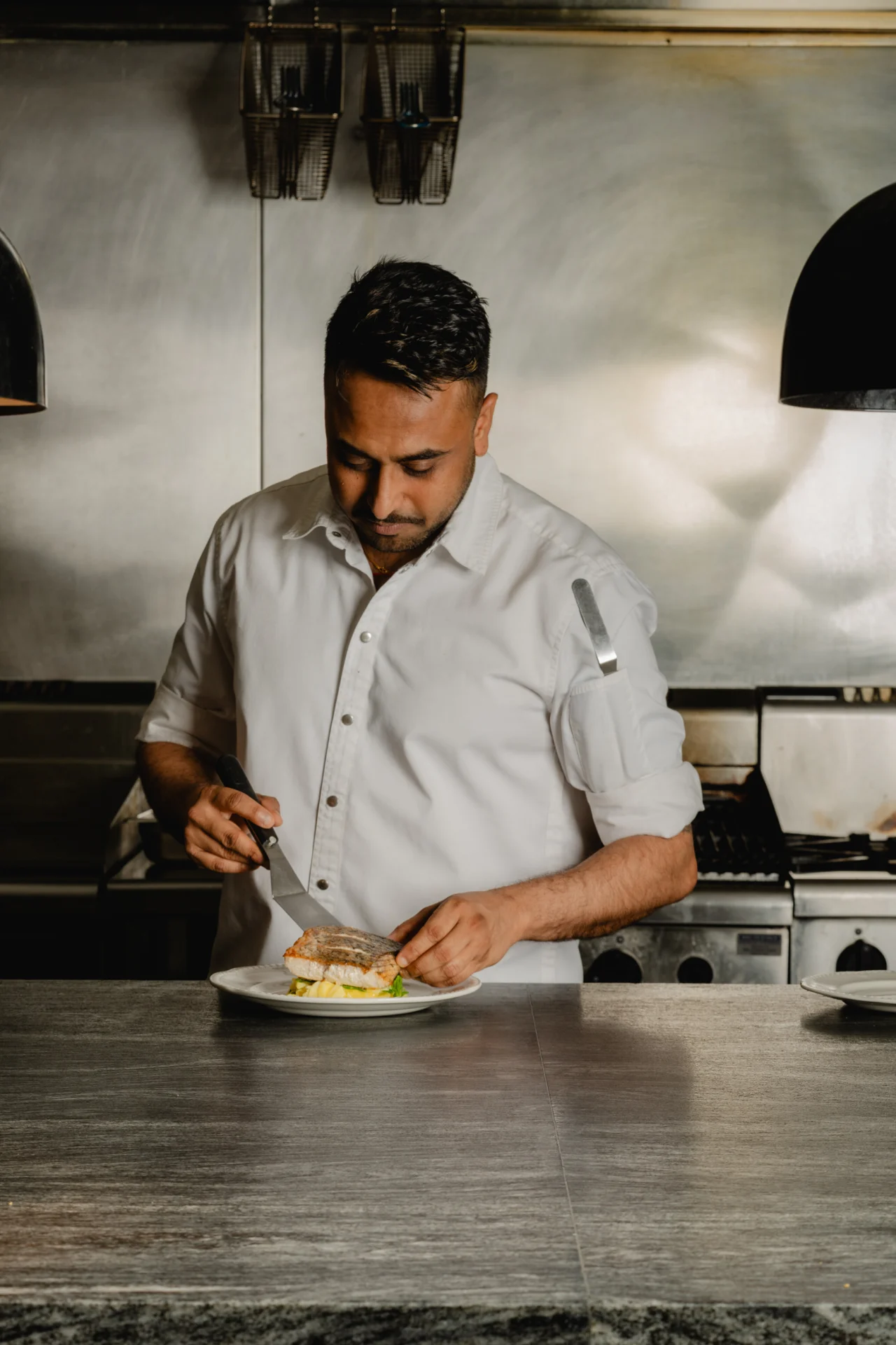 Head Chef platting at Birdie Bar and Brasserie